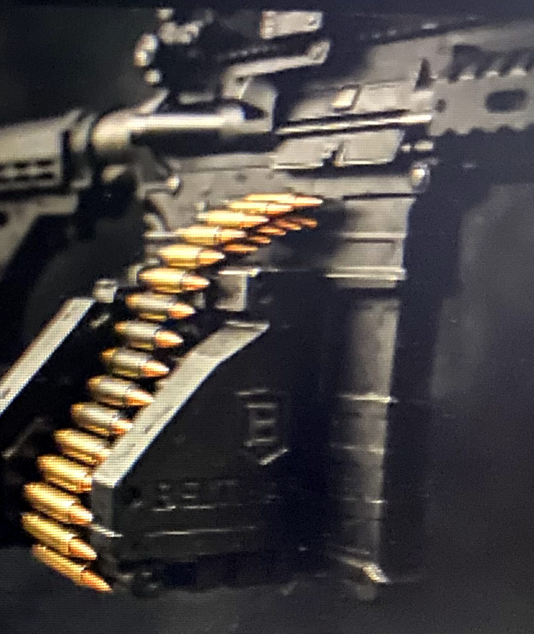AR-15 rifle fitted with the BeltMag belt-fed magazine system